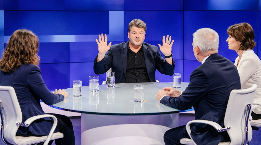 British television panel discussion with presenters